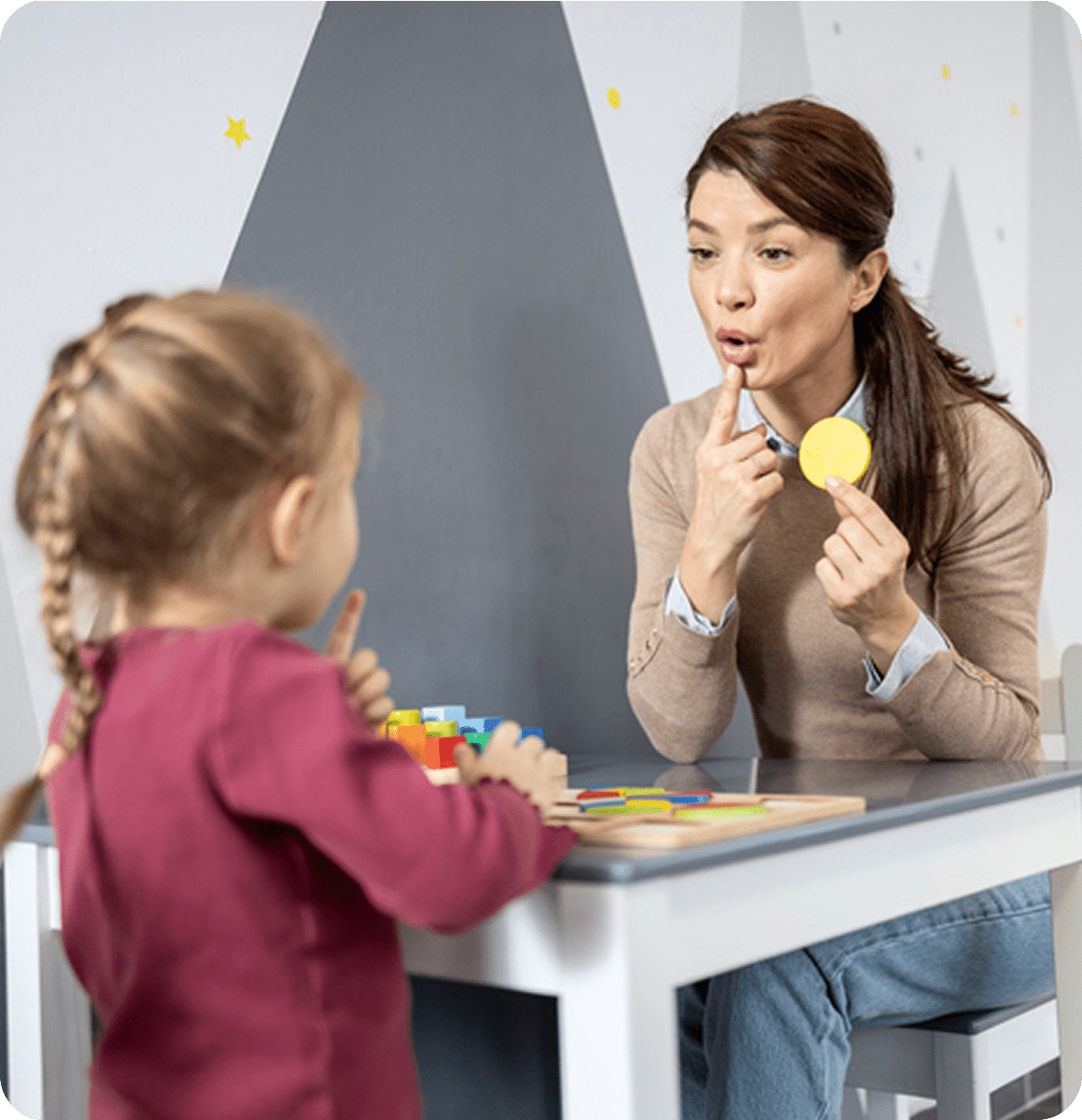 Child learning colors during therapy session
