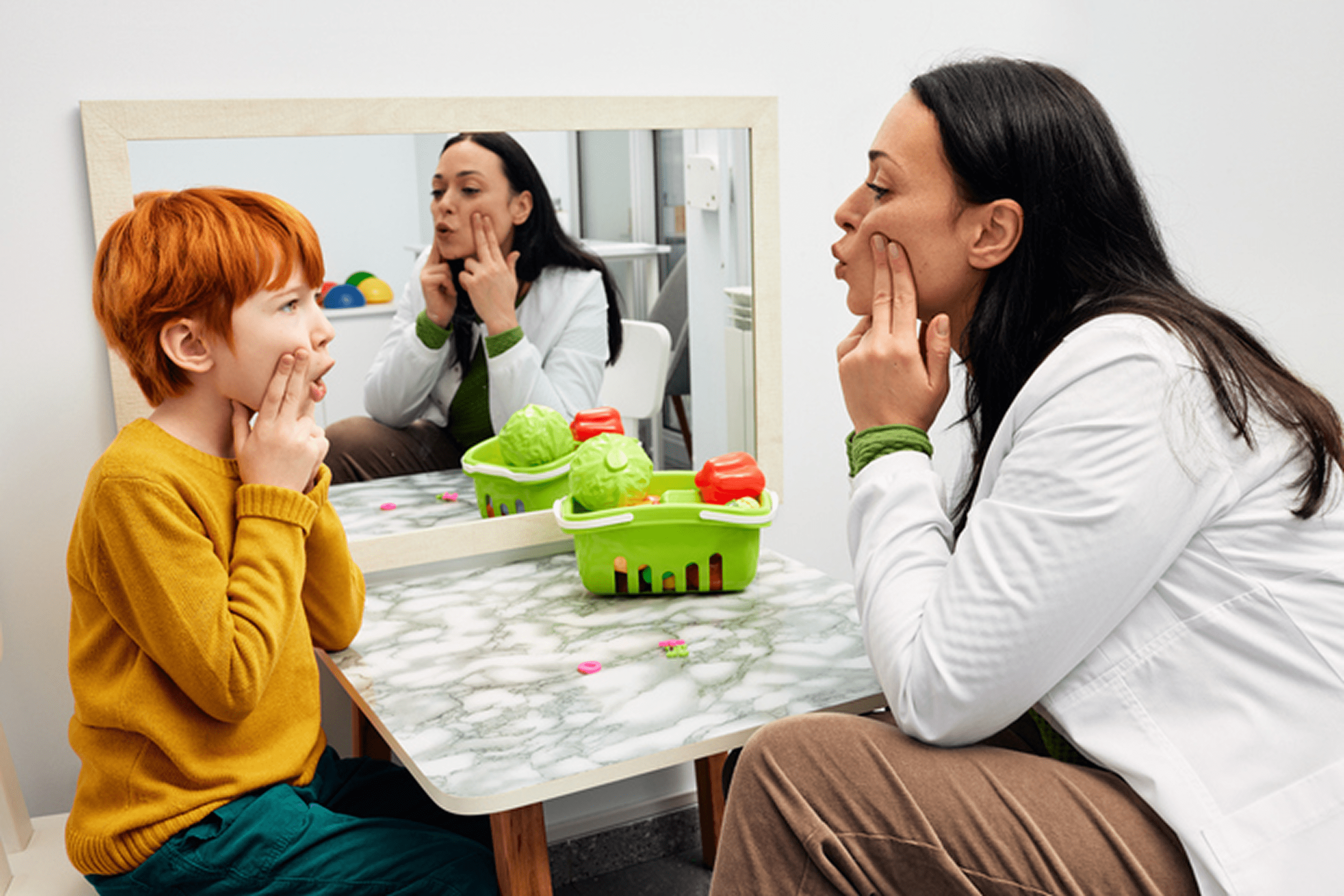 Speech therapy session with mirror