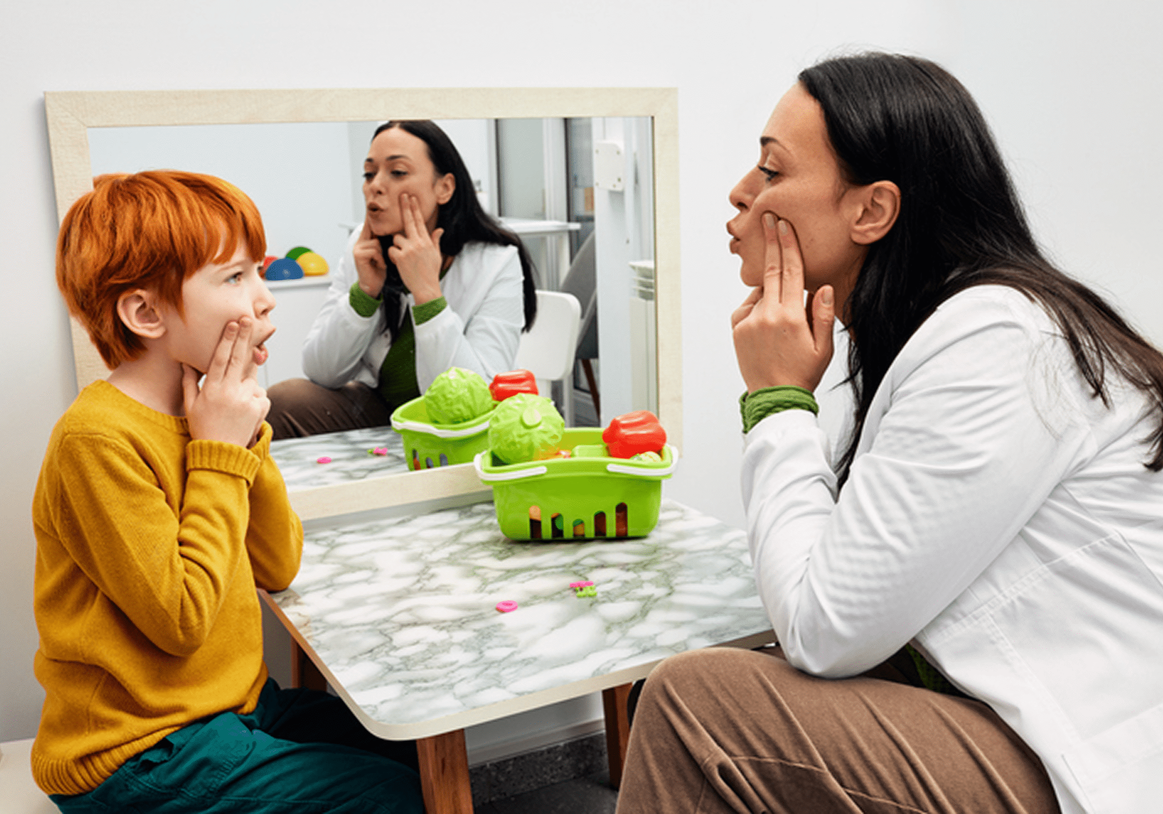 Speech therapy session with mirror